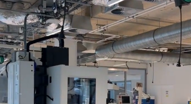 Makers collaborating on prototypes at FabLab > Dassault Systèmes