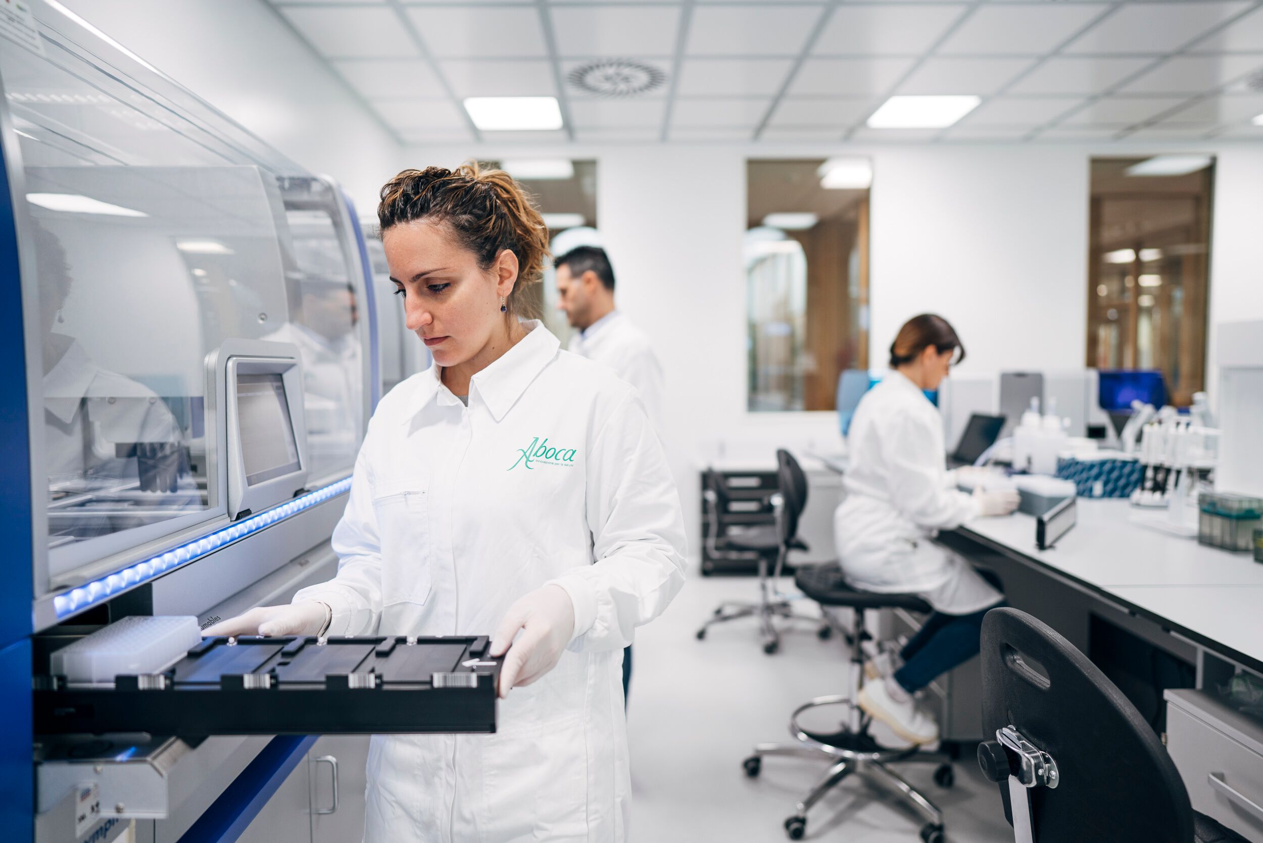 Aboca scientist analyzing plant-based samples in a BIOVIA ONE Lab digital environment for natural healthcare innovation