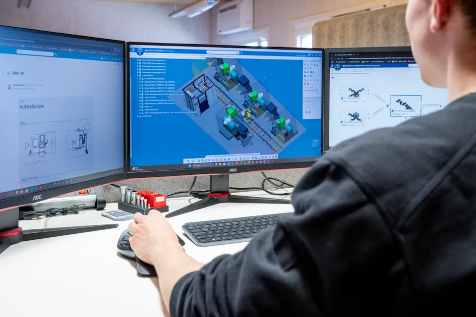 3D model showcasing an automated machine built by automation.eXpress for efficient manufacturing processes