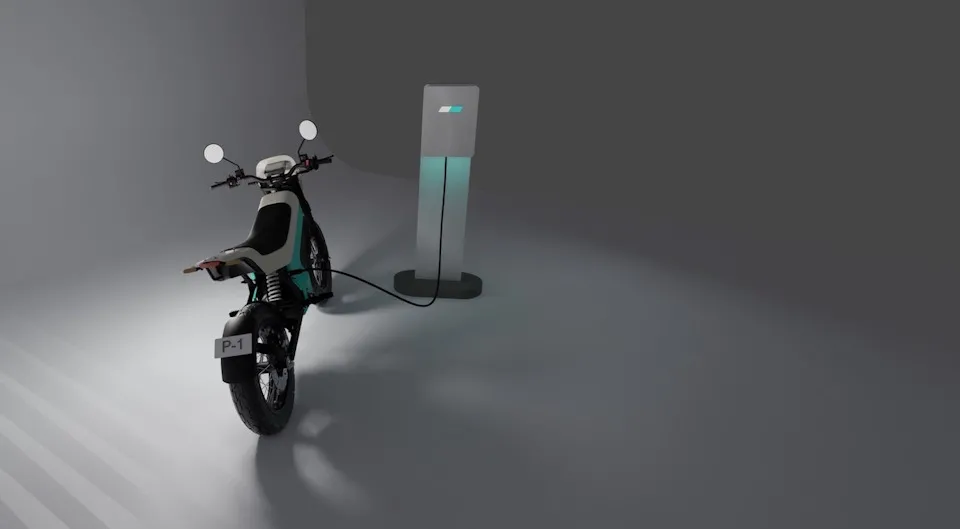 Yatri electric motorcycle charging at a modern station in Kathmandu, Nepal.