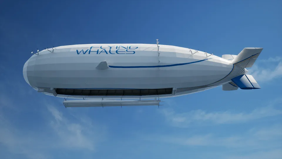 Flying Whales LCA60T hybrid helium-electric airship in flight, a 200-meter cargo airship designed for heavy payload transport.