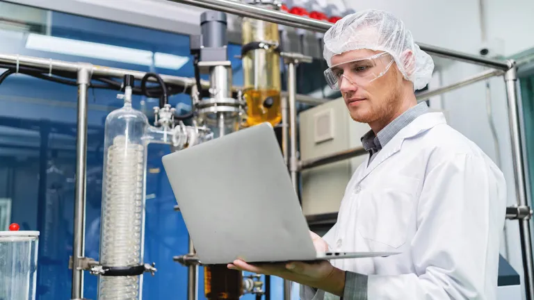 An analyst monitors manufacturing equipment > Dassault Systemes