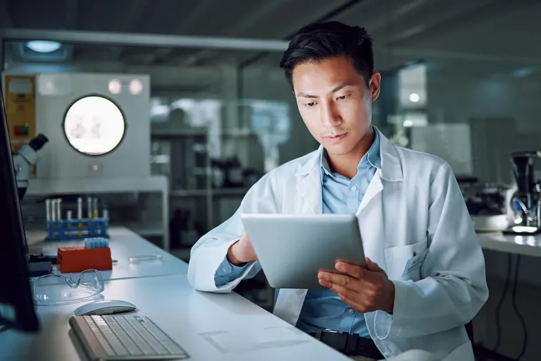 Automated QC lab with digital instruments showcasing BIOVIA solutions for efficient data capture and batch release processes