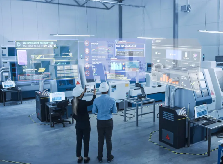 Factory operator using DELMIA MES Software and Virtual twin technology to monitor real-time production on a digital interface