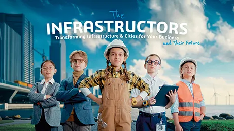 Five diverse children stand confidently in front of a digital cityscape, symbolizing the future of smart infrastructure.