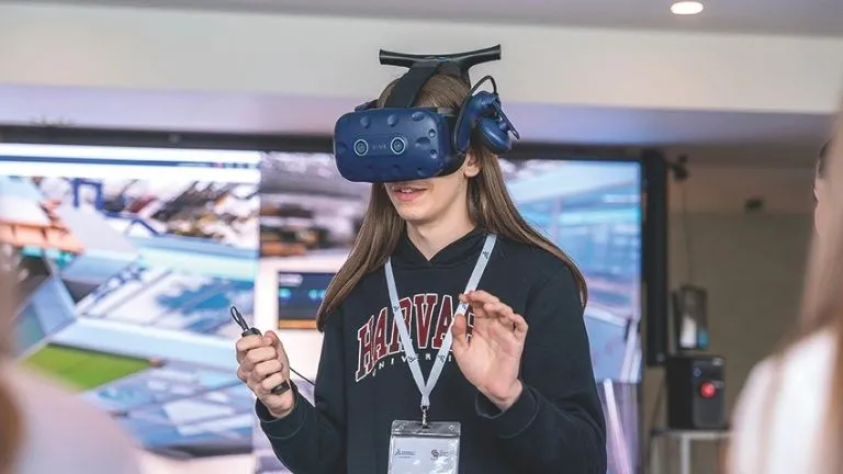Students explore Virtual Twins and technology during the Cordées de la réussite event at Dassault Systèmes headquarters.