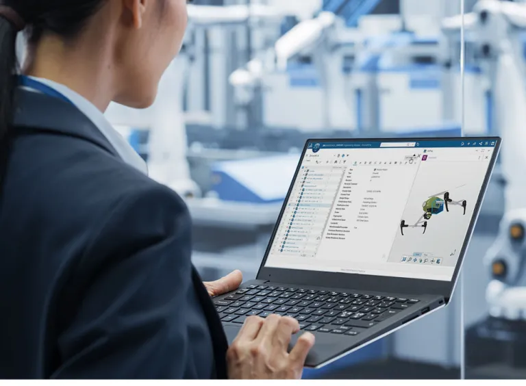 Stakeholder reviewing the product lifecycle 3DEXPERIENCE platform, showcasing collaboration and data-driven decision-making
