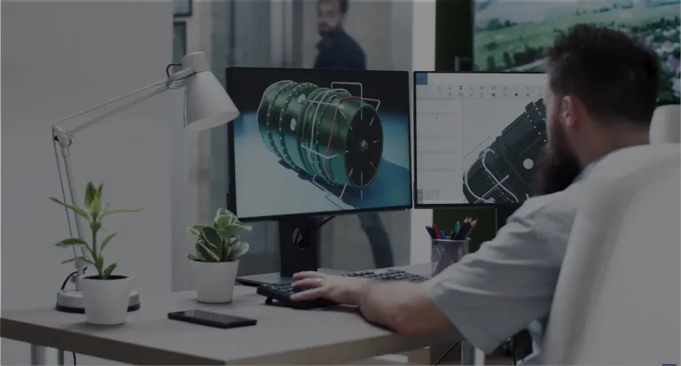 Engineer using cloud-based 3DEXPERIENCE CATIA on a laptop for resilient 3D modeling and real-time collaboration.