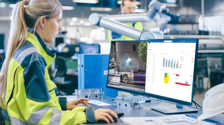 Woman engineer working on a DELMIA CAD project