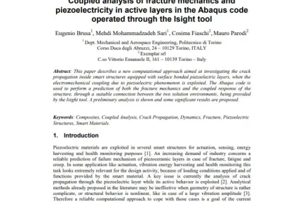 Coupled analysis of fracture mechanics and piezoelectricity in active layers in the Abaqus code operated through the Isight tool