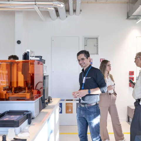 Innovators collaborating on sustainable projects at 3DEXPERIENCE Lab's fablab